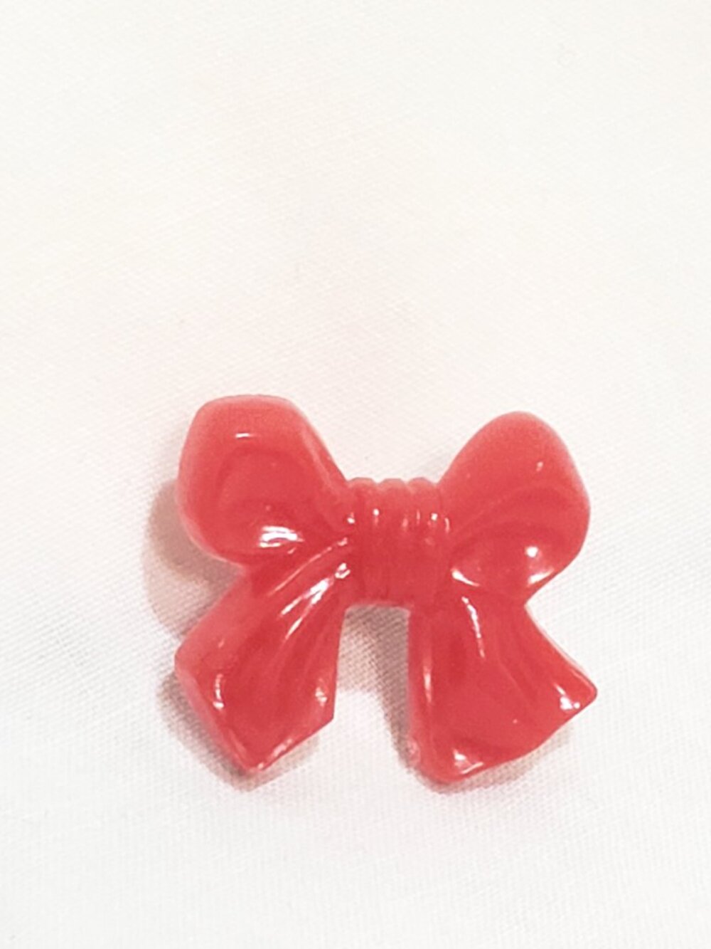 Red Ribbon Bow Resin Lapel Pin 3/4" ASI